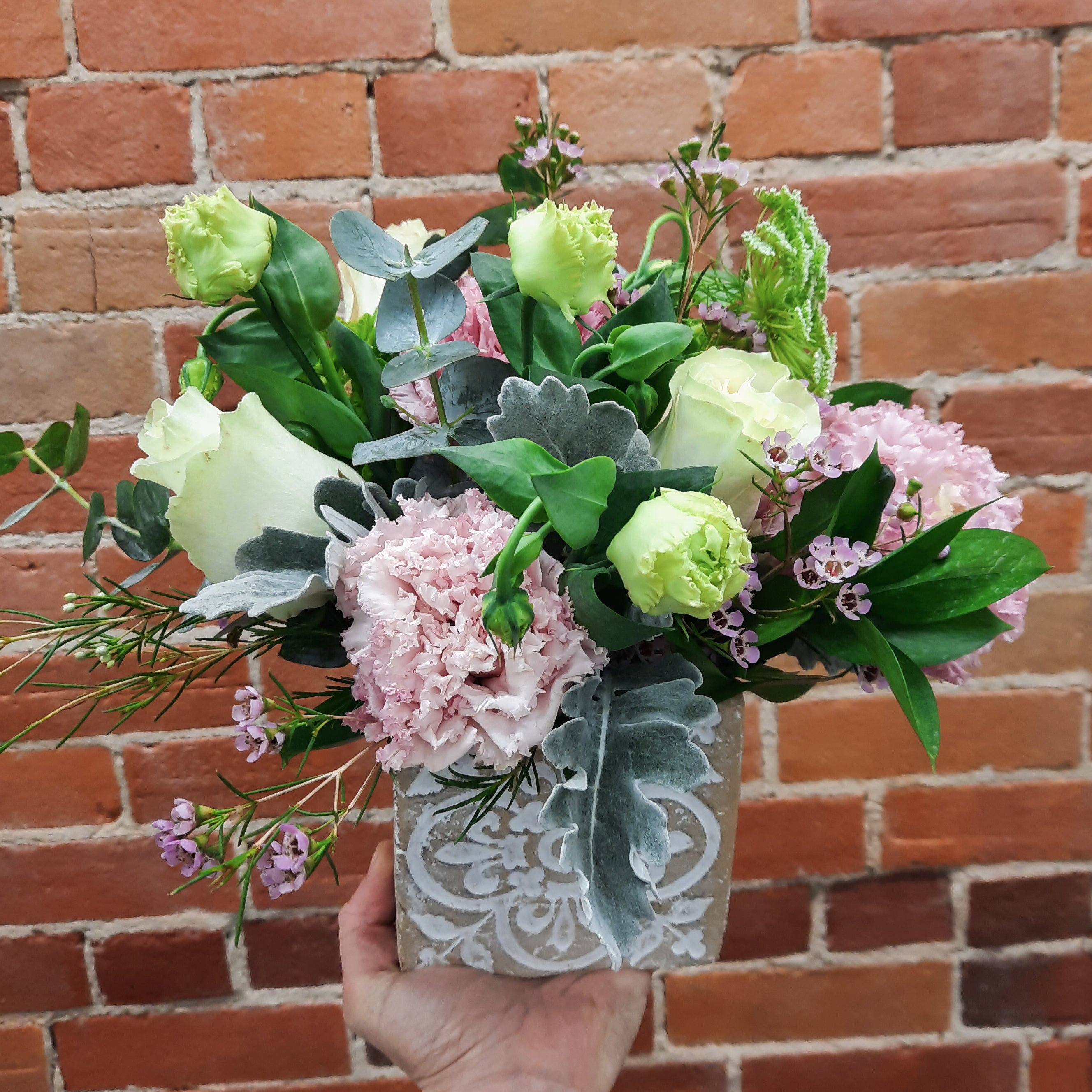 BLOOMS IN CONTAINERS The Floral Boutique