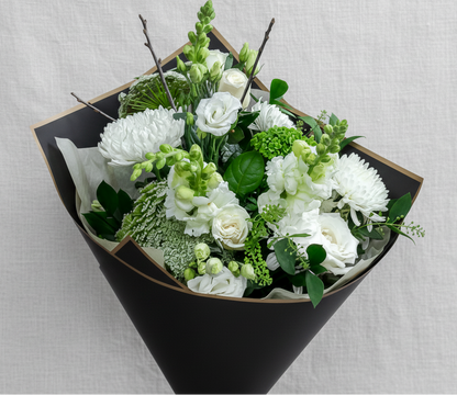 Pure & Simple hand‑tied bouquet with soft white flowers handcrafted in Carleton Place