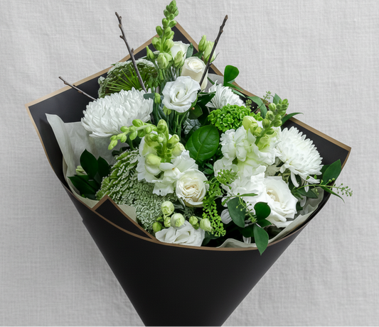 Pure & Simple hand‑tied bouquet with soft white flowers handcrafted in Carleton Place